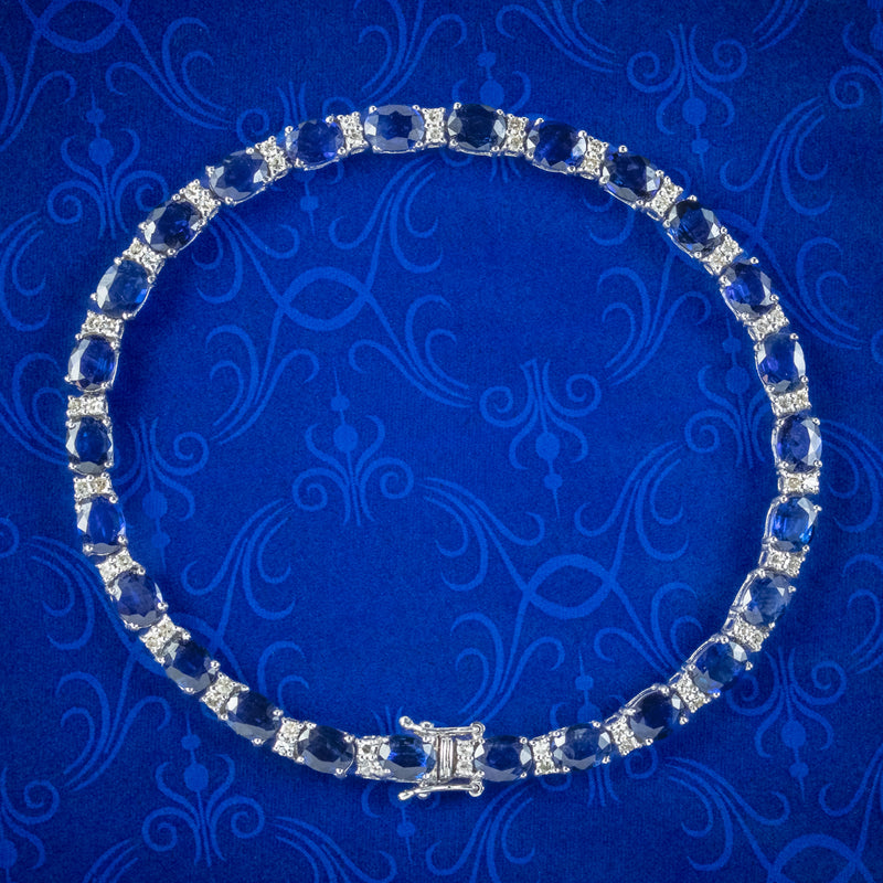 Tennis bracelet in white gold with blue sapphires about 2,75 wide Carat  6,32 Measure 17.5